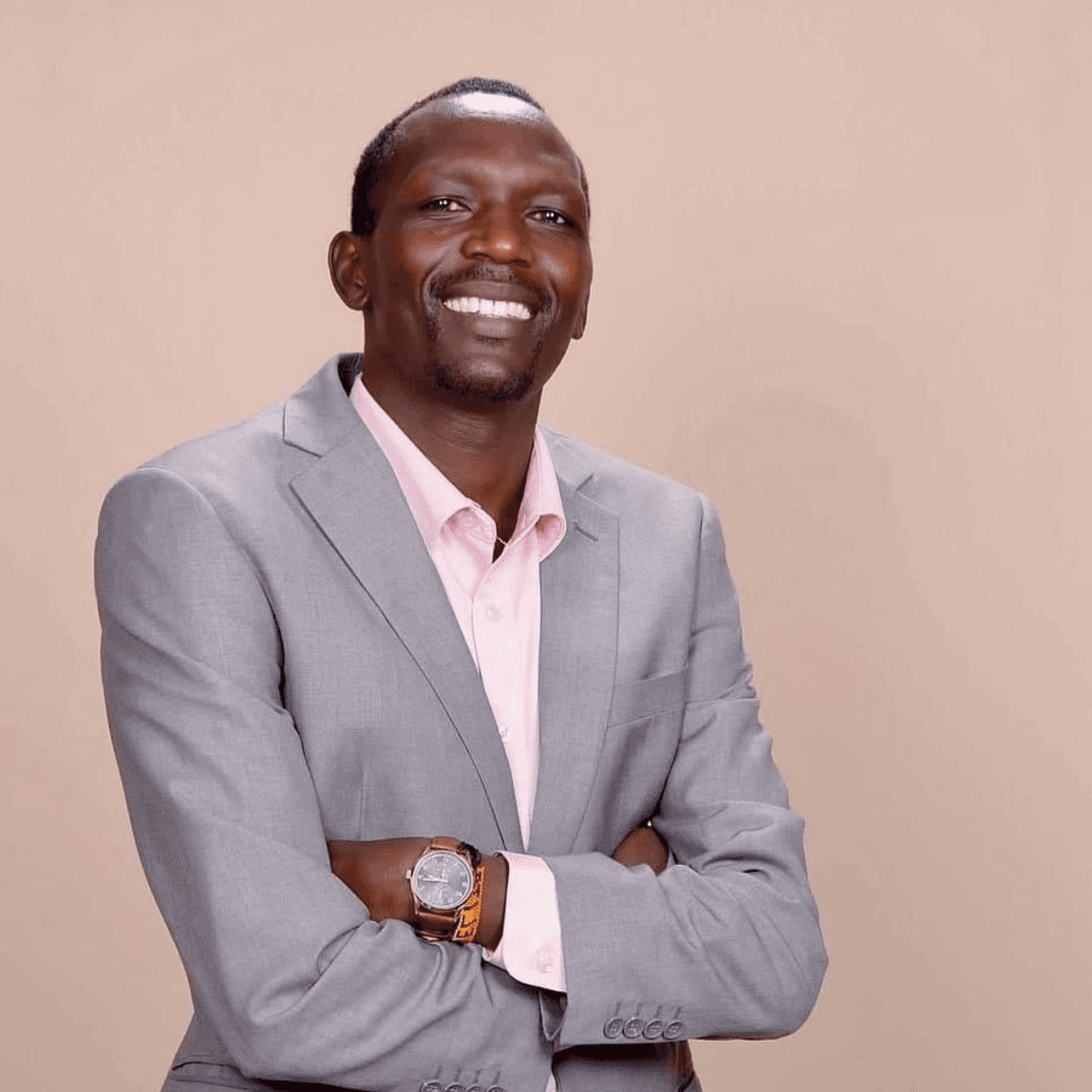 Photo of Haron, owner of Peak Elite Medride, smiling as he shares his positive experience